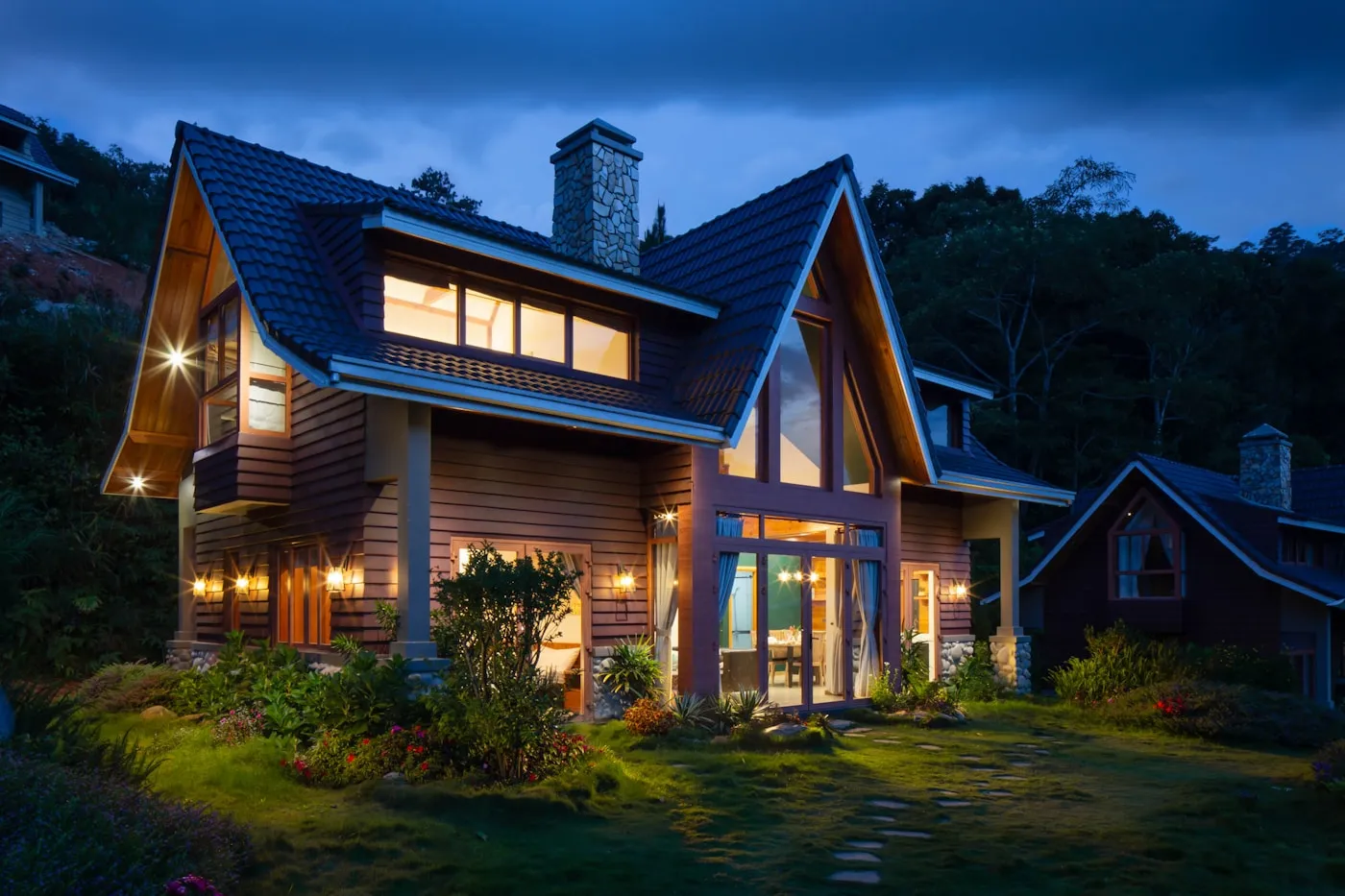 Freshly painted Pacific Northwest home with crisp white trim and a copper-toned front door